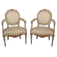 Pair of French Louis XVI Arm Chairs