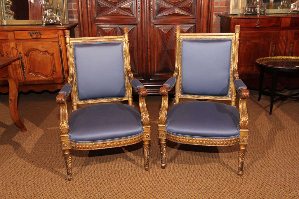 Pair of French Gilt Napoleon III Style Armchairs

These are a nice pair of medium size Napoleon III style armchairs.  They have been recently reupholstered with high quality fabric. 

The chairs have the old gilt that has worn to create a lovely