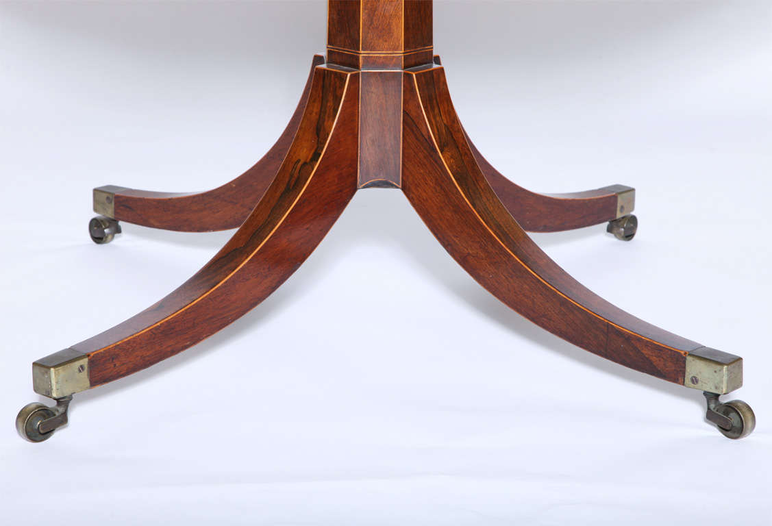 English A Regency rosewood octagonal center table. For Sale
