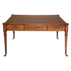 A late George III mahogany writing table.