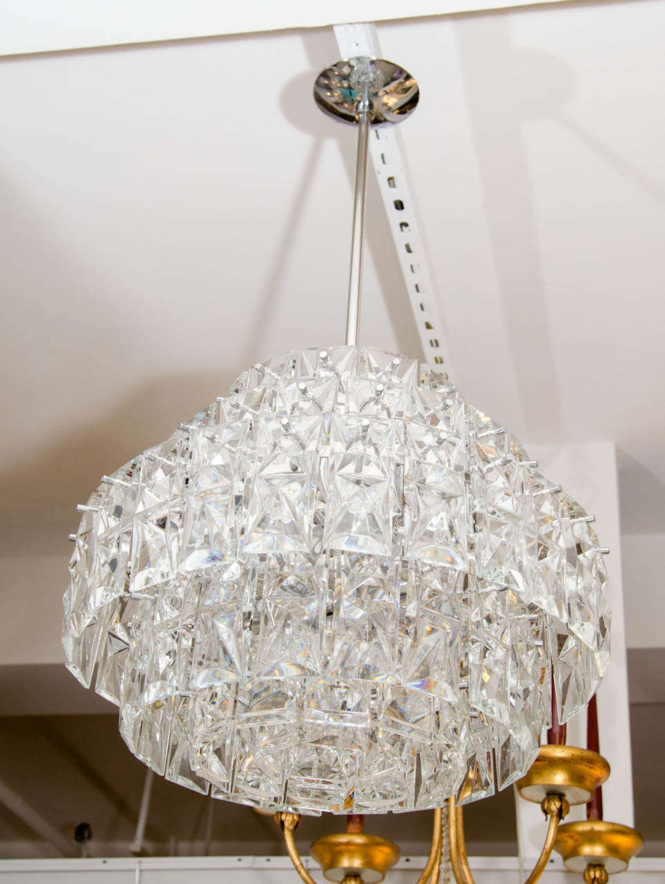 A stunning six-tier German crystal chandelier, circa 1970s.