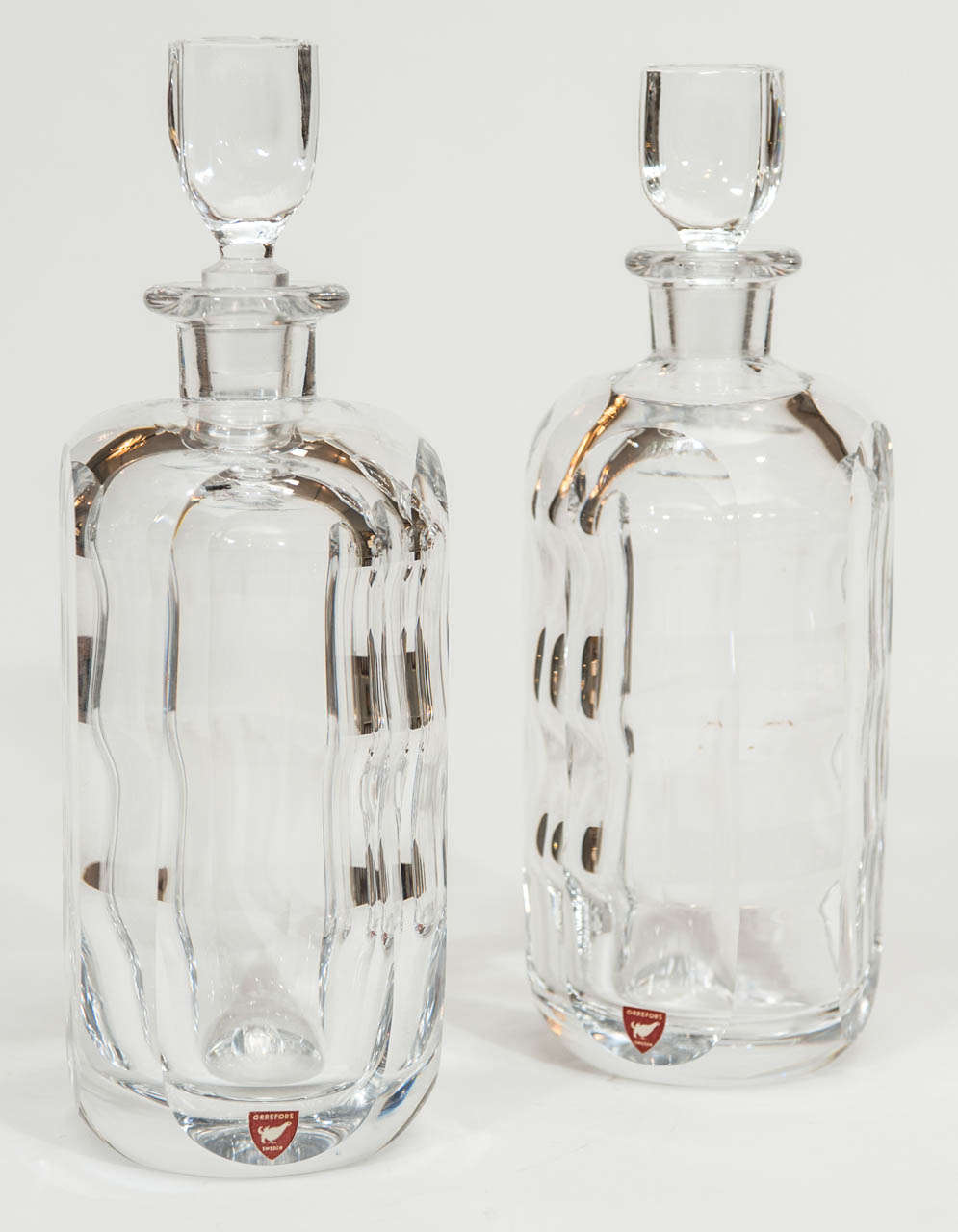 An immaculate pair of cut crystal decanters in
a modernist style. These stunning decanters were
are from a prominent Toronto home and were never
used....a great holiday gift !