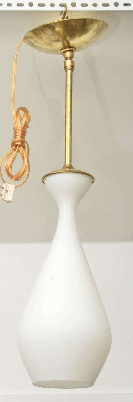 Frosted glass pendant single standard bulb up to 100 watts.
