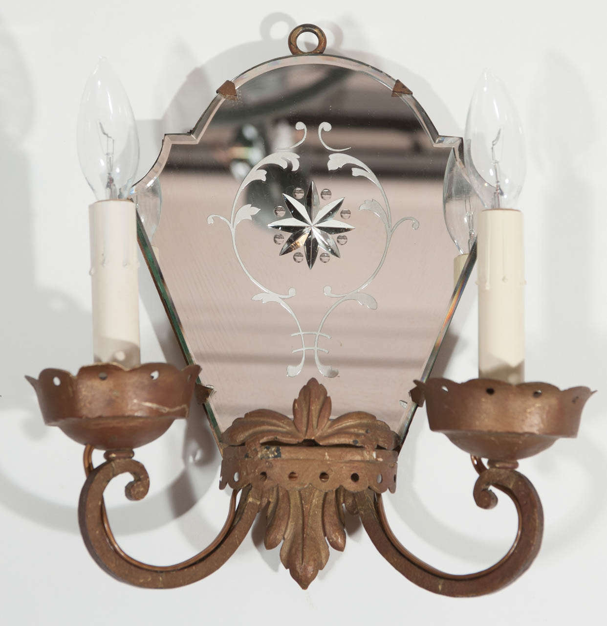 Pair of Italianate mirrored and giltmetal double branch sconces.