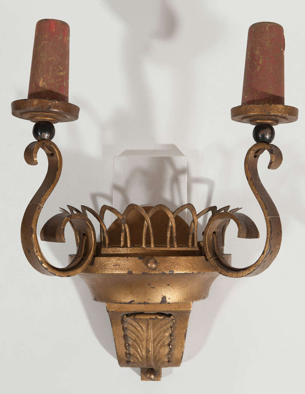 Pair of 1940's styled metal sconces with original goldgilt finish.
Also retaining original red slightly marbelized candlecovers.
Rewired to North America standards.
