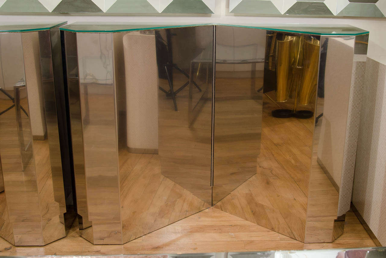 Stainless steel, brass and glass geometric form console table.
