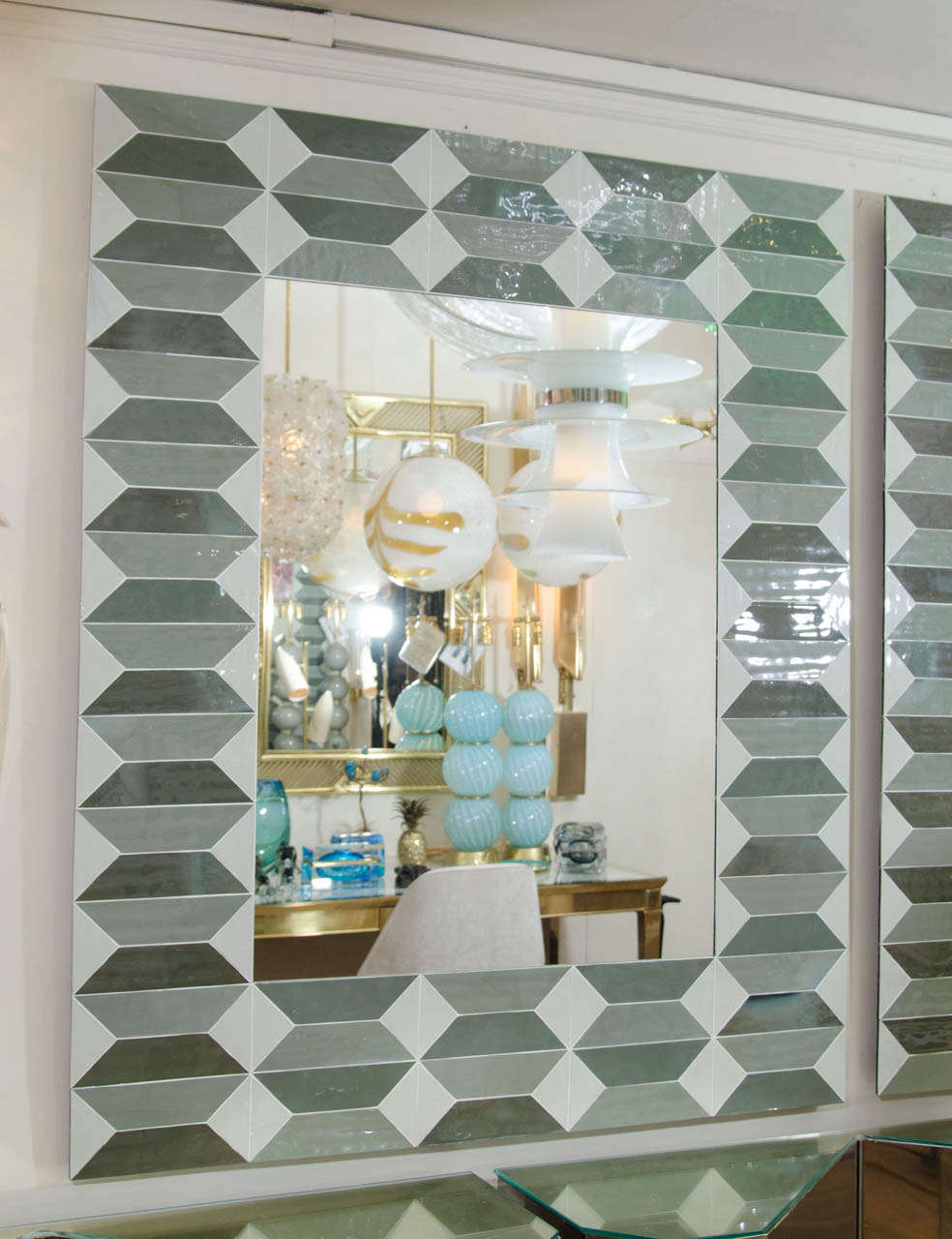 Rectangular mirror with gray opaline glass, geometric design surround design.