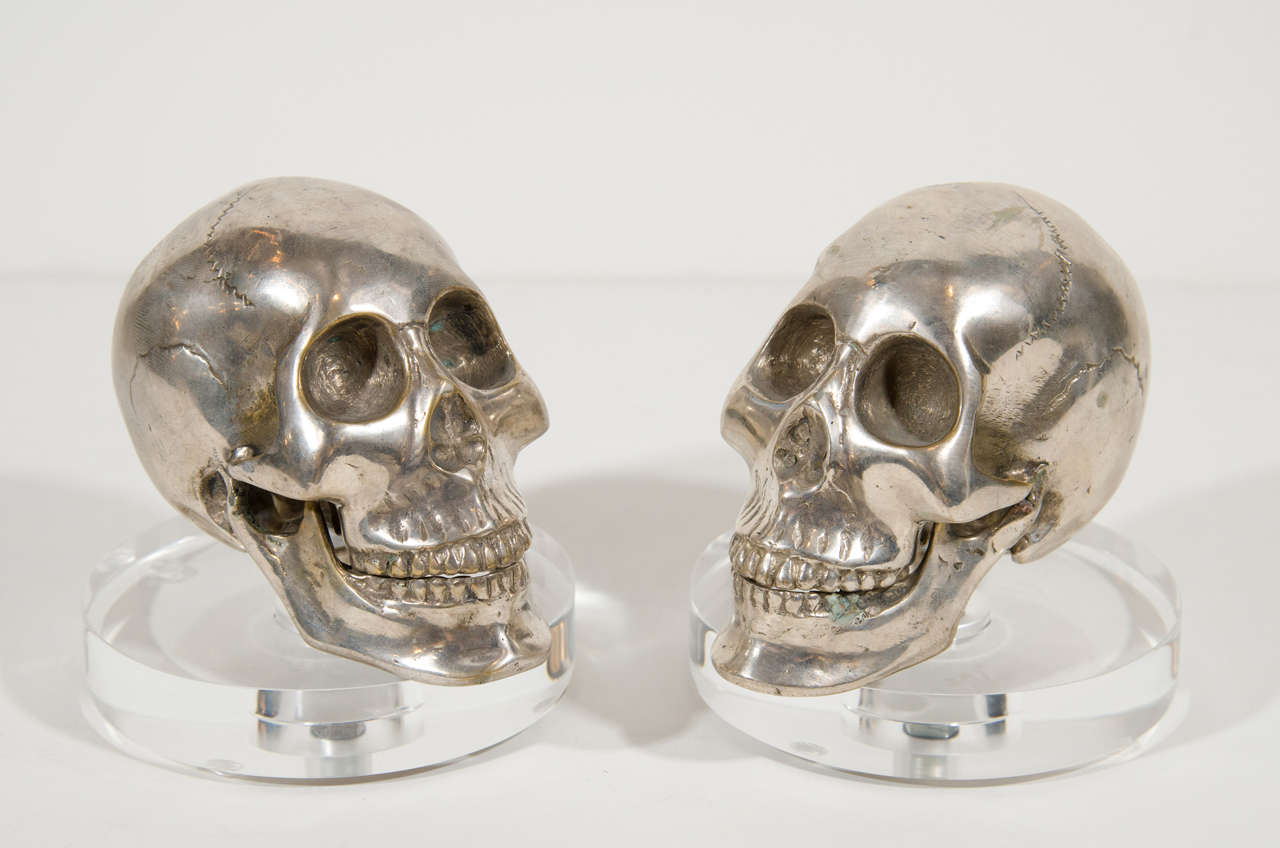 Italian Pair of Hand Forged Silvered Metal and Lucite Skull Bookends