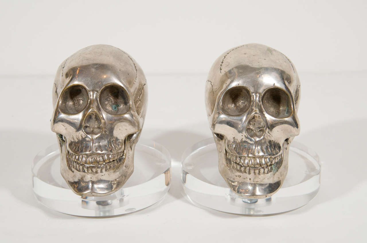 Pair of Hand Forged Silvered Metal and Lucite Skull Bookends In Excellent Condition In Fort Lauderdale, FL