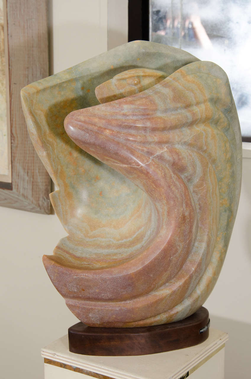 A vintage marble sculpture of an eagle by Native American artist Presley LaFountain on a wooden pedestal.

Presley LaFountain has been the recipient of many prestigious awards and commissions, including the 1976 Institute of American Indian Arts