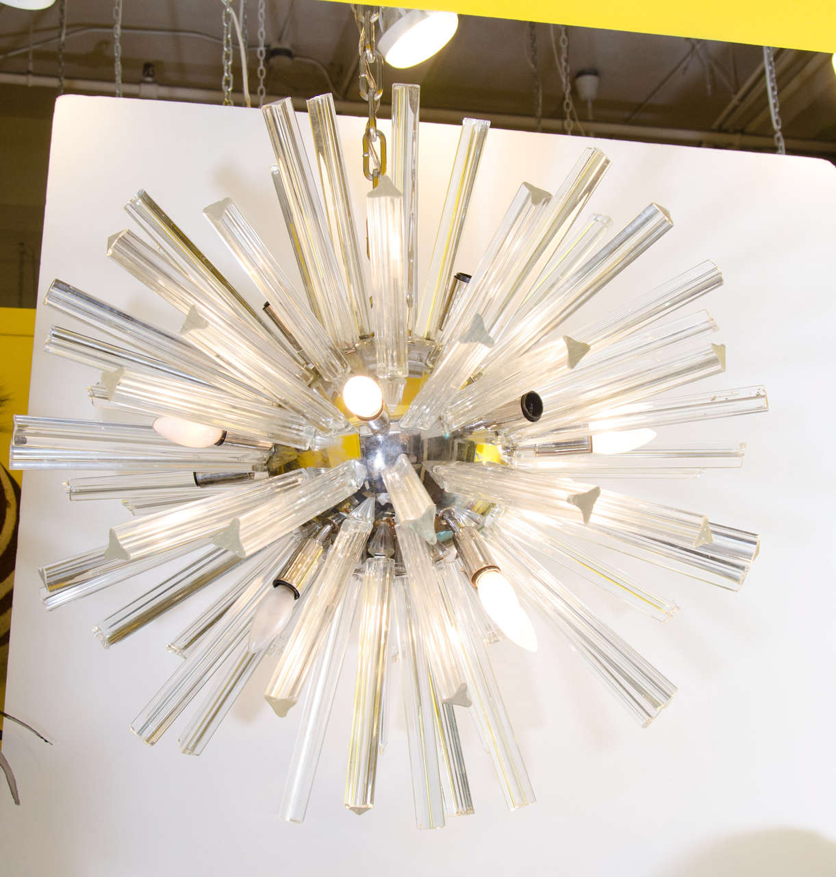 A vintage substantial Sputnik chandelier with tri-pointed glass rods radiating out of a chrome center ball. 

Good vintage condition with age appropriate wear. 

Diameter: 30"

Reduced from: $12,500