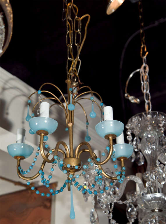 BRASS AND BLUE GLASS CHANDELIER- FIVE LIGHTS- REWIRED - TWO DROPS MISSING