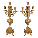 Pair of Rococo style brass candelabra