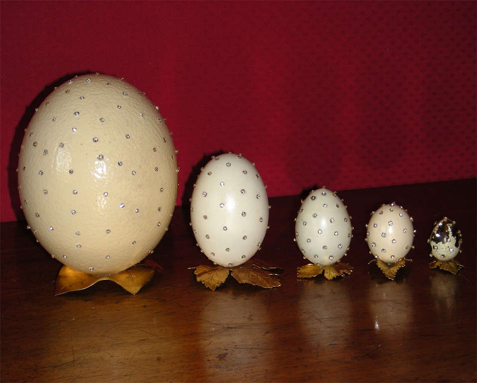 Set of six 1996 eggs decorated by  Frédérique Lombard Morel: ostrich, goose, hen, quail. Made for the Christmas windows decorations of Hermès on the Avenue George V in Paris.  Crystal and metal gilt with a 24 Karat gold solution. Smallest egg height