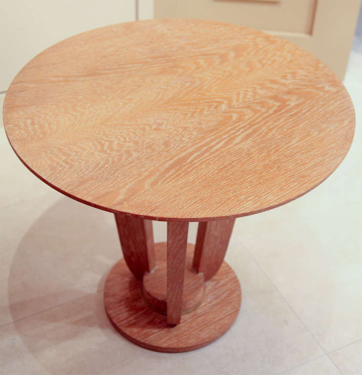  Side table in oak in the manner of LeLeu with a banding in bronze on the base.