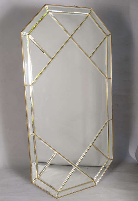 Mirror, having octagonal shape, with brass 