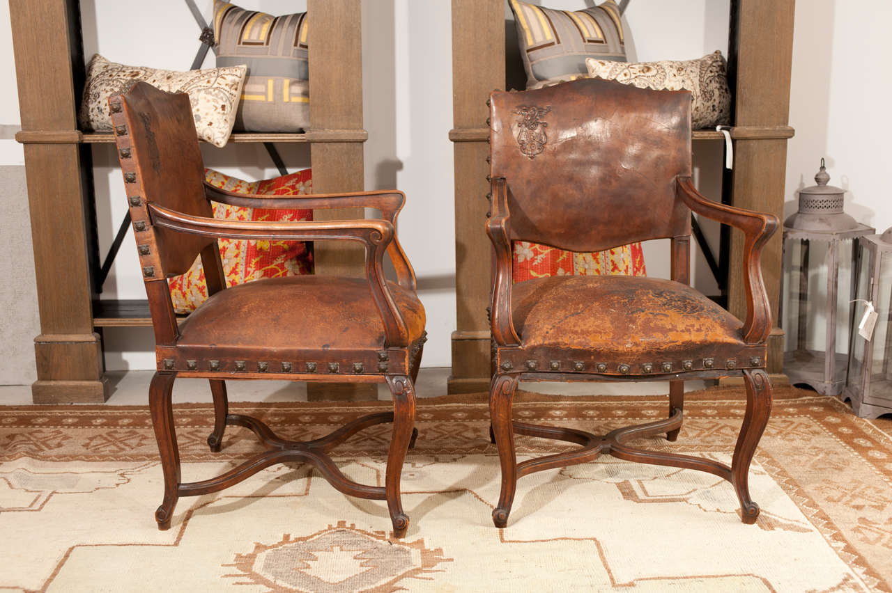 French Pair of 1920's leather  armchairs 