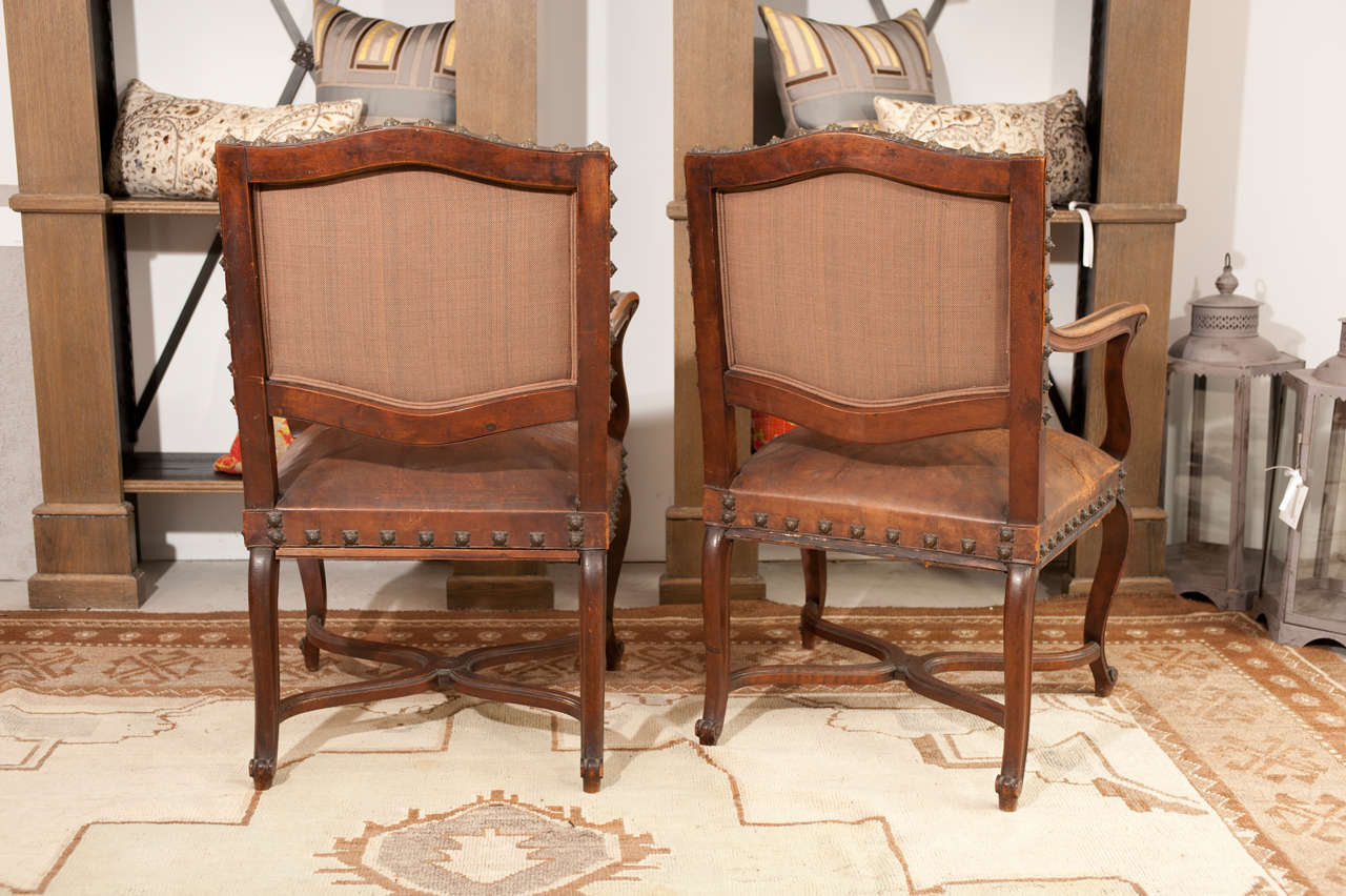 Pair of 1920's leather  armchairs  In Good Condition In Toronto, ON