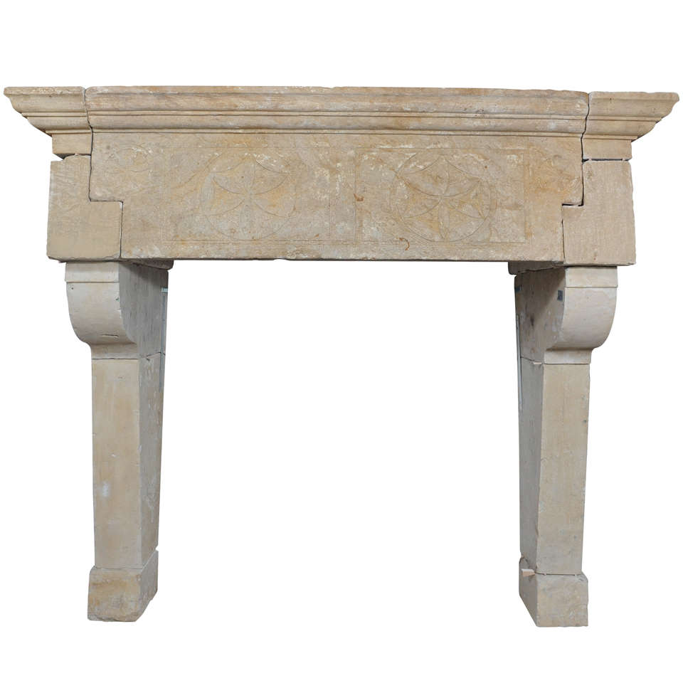 A 17th century east-French limestone castle fireplace / mantle piece