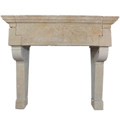 A 17th century east-French limestone castle fireplace / mantle piece