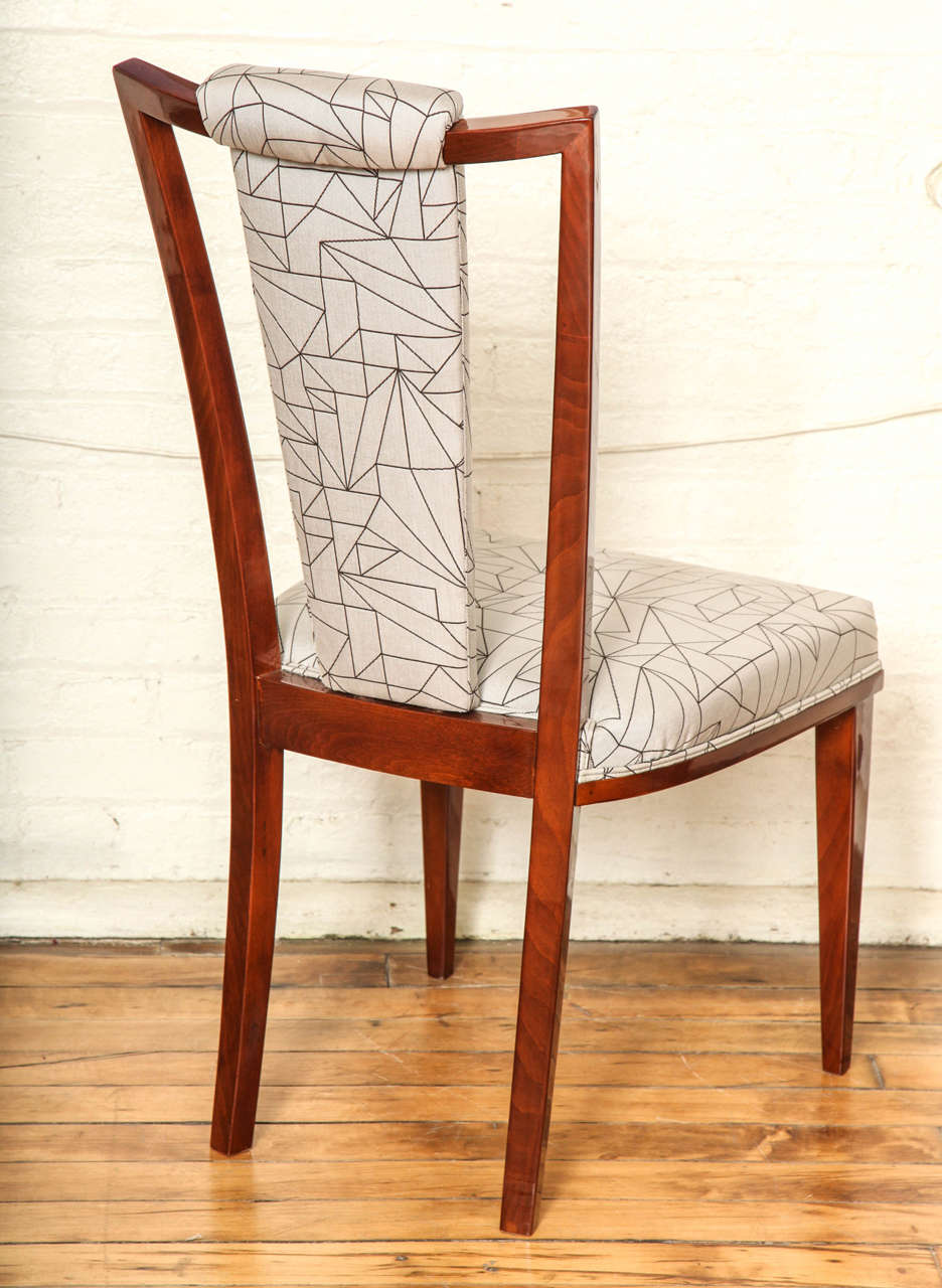 20th Century Elegant Suite of Eight Mid-Century Modern Dining Chairs