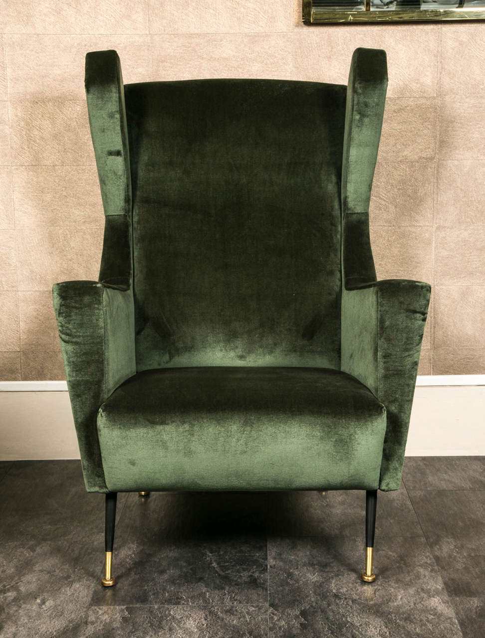 Pair of 1950 italian armchairs . Metal guilted legs