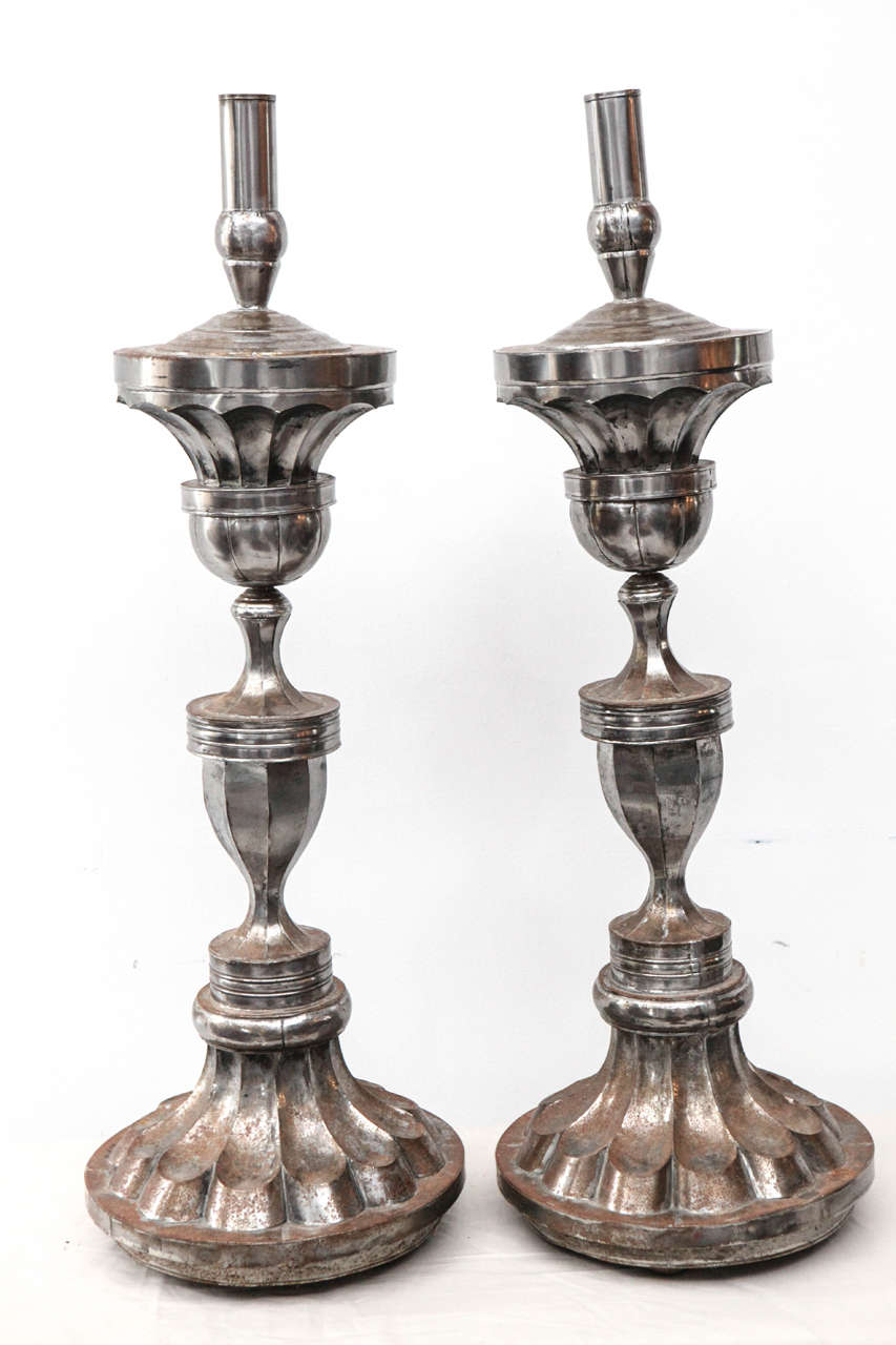 Large metal candle holders with 1 5/8" opening.