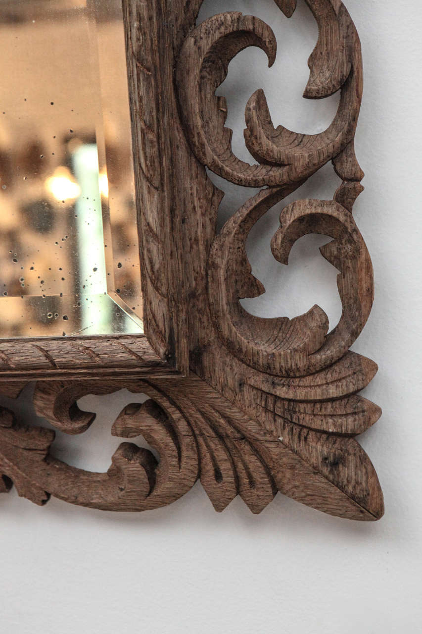 large carved wooden mirror