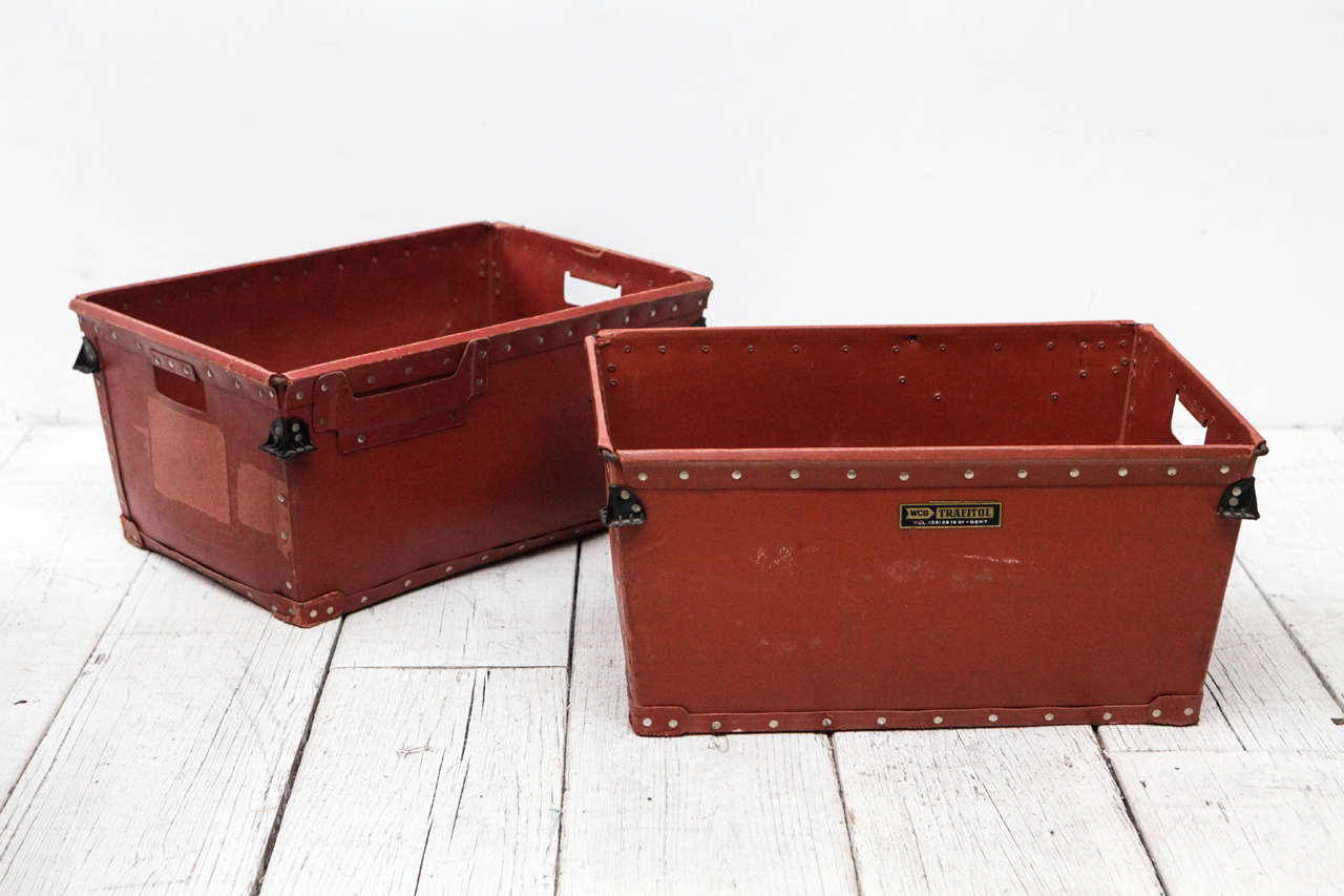 Industrial red melamine and paper bins / boxes from Ghent, Belgium.