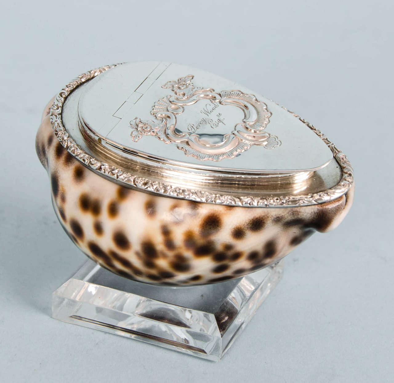 Beautifully fashioned William IV silver-mounted Cowrie shell snuffbox,
circa 1825. Marked with makers mark only, 