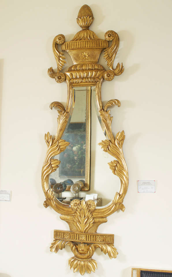 A large pair of Gilded Mirrors