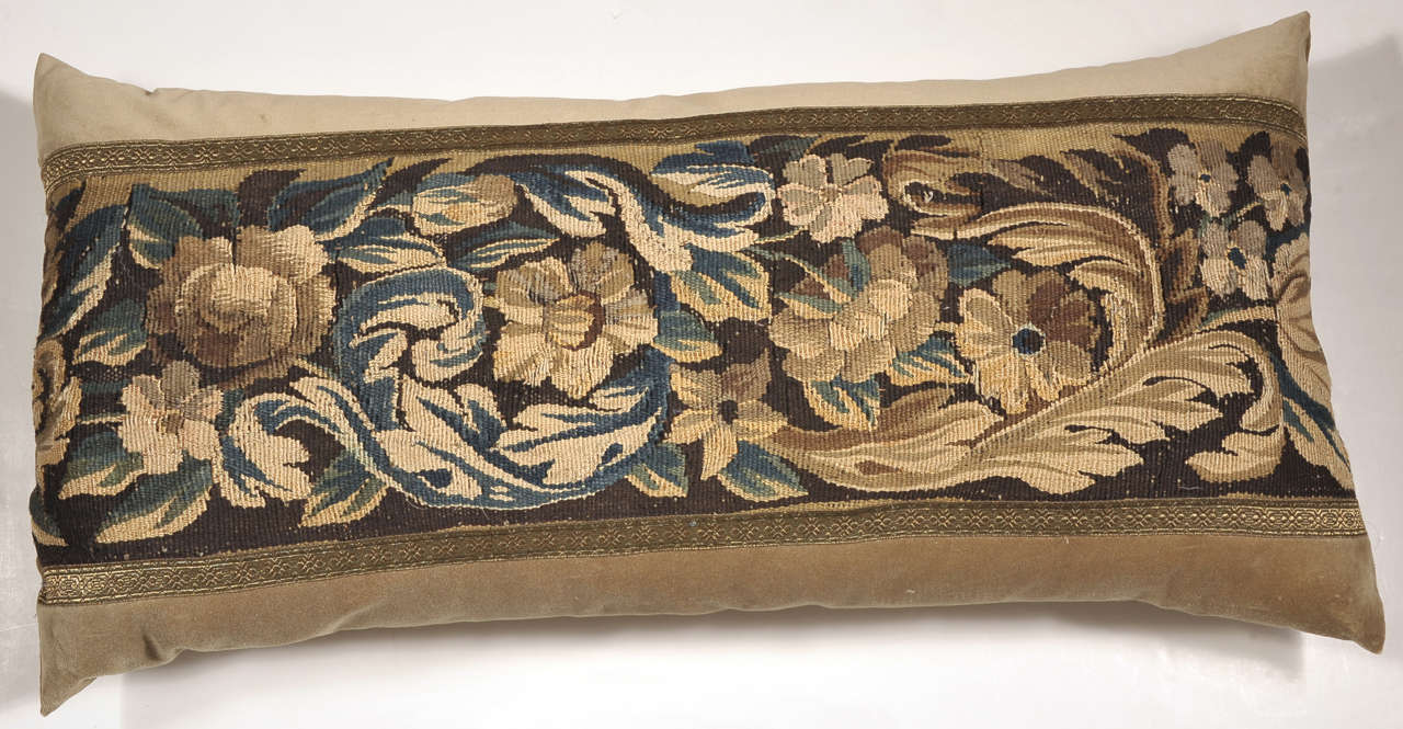 18th century tapestry large lumbar pillow constructed of 100% cotton velvet in beautiful beige color. Tapestry is framed with metallic gold trim. Down filled.

Date of manufacture: 2015