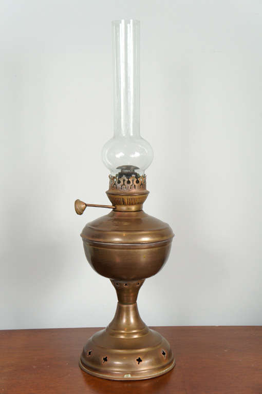 Pair American  19th century brass oil lamps with early glass
hurricane shades.