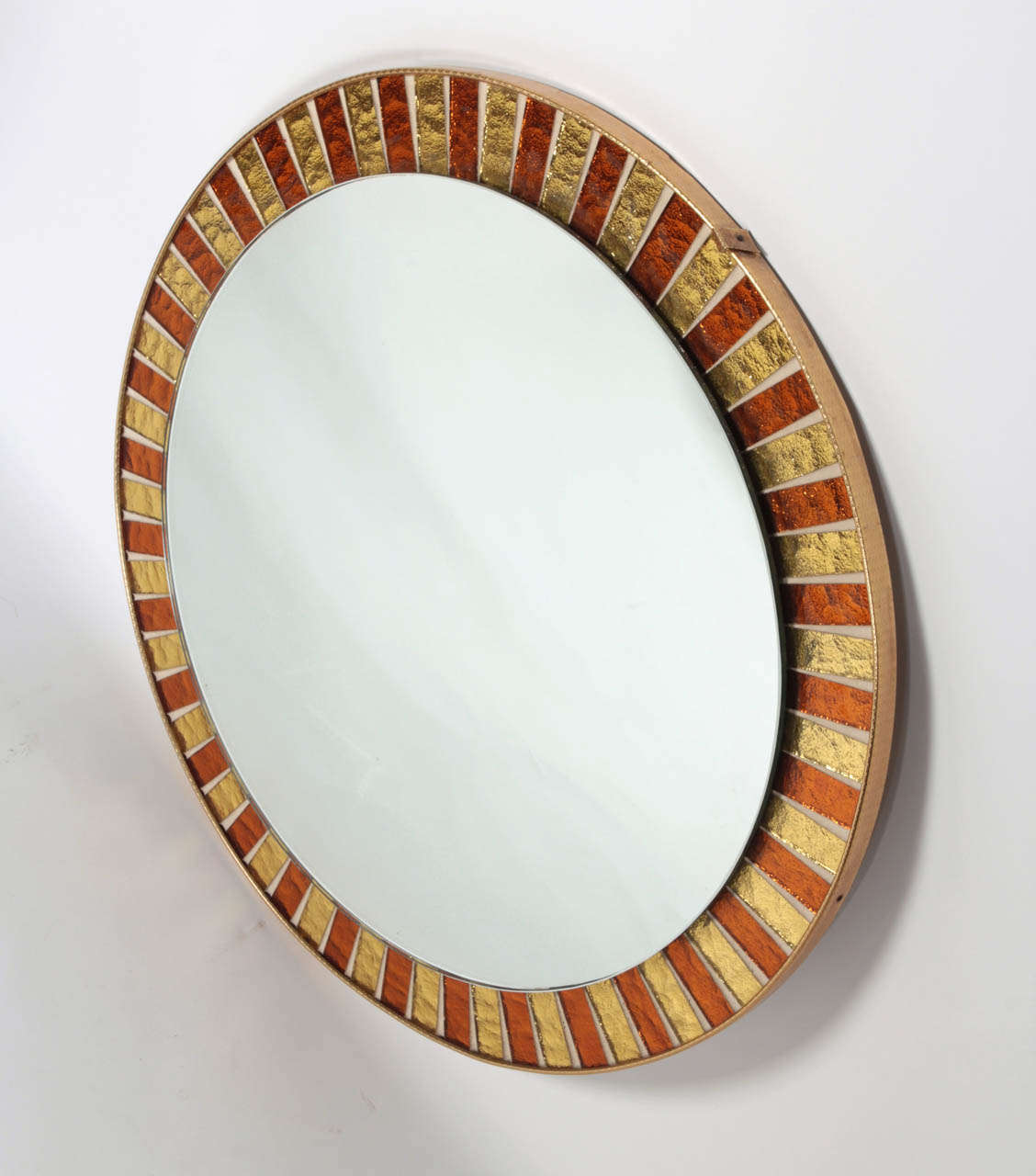 Round Spanish 1960s mirror with alternating copper and gold mosaic.

Ref #: DM0609-07

Dimensions: 22