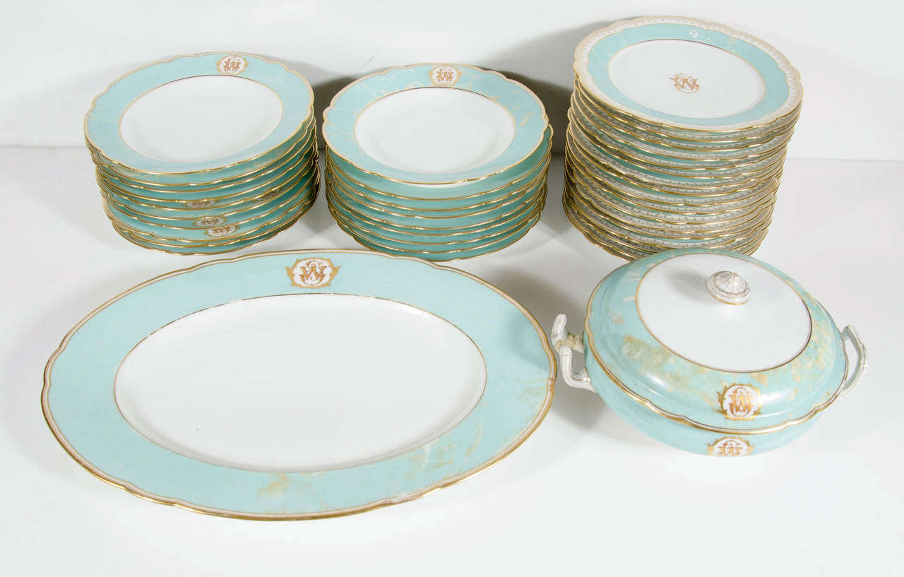 This stunning set so reminded me of Downton Abbey that i had to buy it. The set is a marbleized Robins egg blue with 24k yellow gold gilt details.It is fine limoge china.