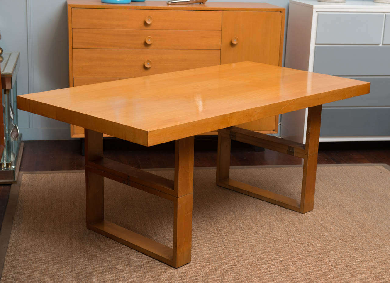 Smartly designed table that converts from a dining table into a coffee table. Designed by Hendrik Van Keppel and Taylor Green for Brown Saltman & Co. 

A secure pin locks the folding legs in place when extended or folded. Very generous size.
