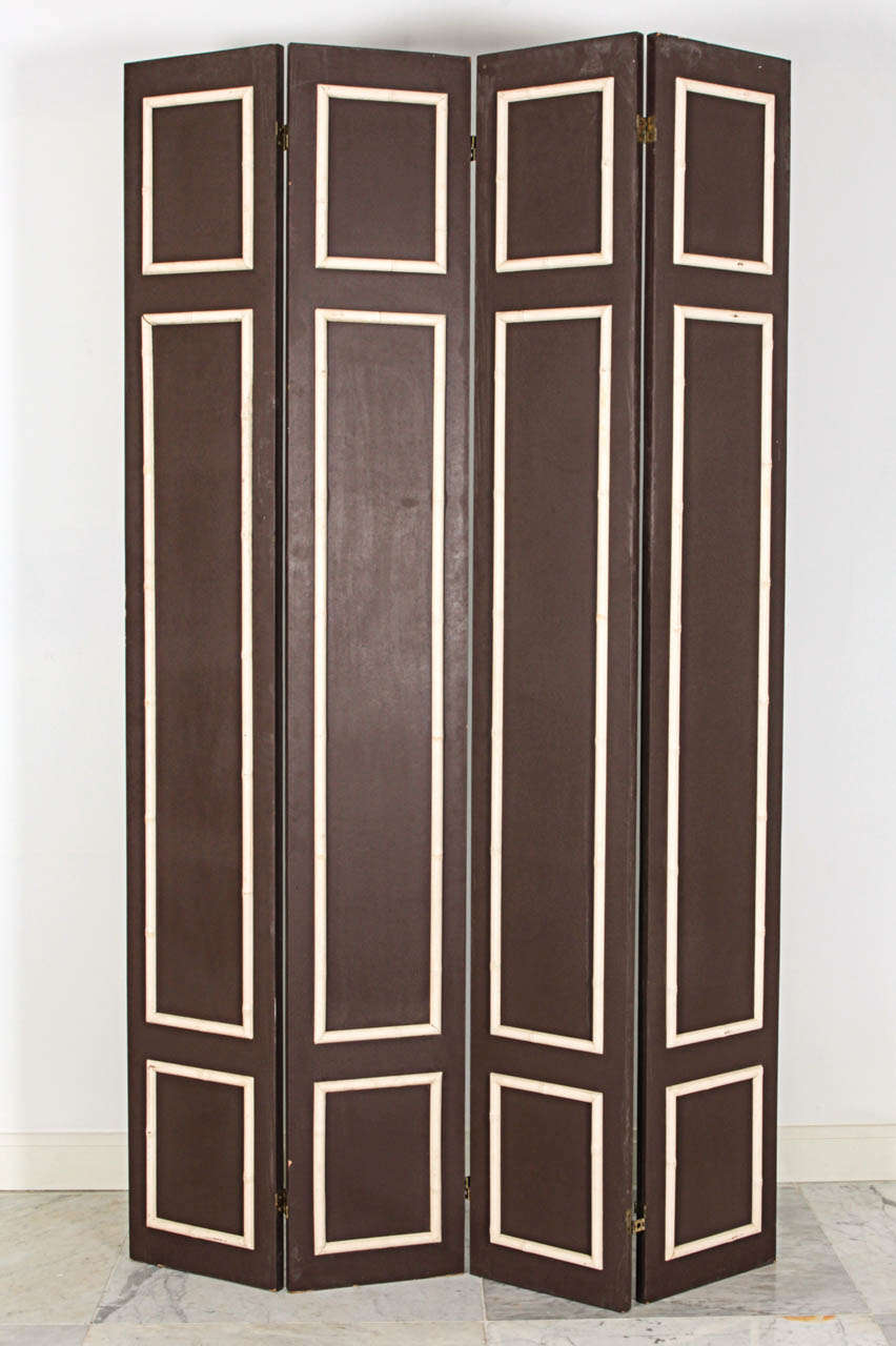 Pair of charming Hollywood Regency painted wood folding screens with bamboo trim.