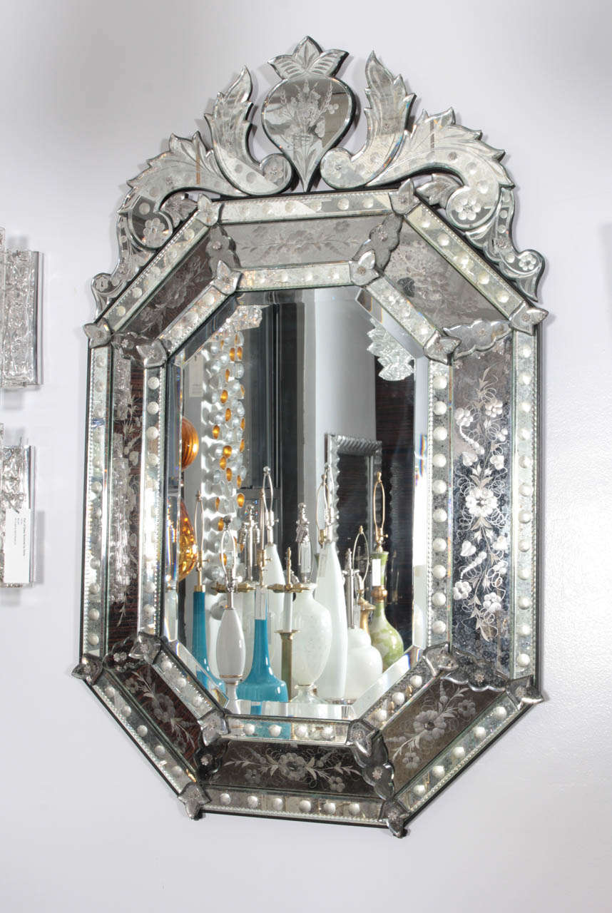 Fantastic etched and beveled edge Venetian mirror.