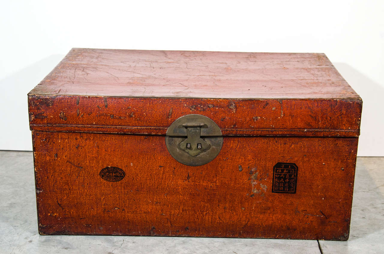 A nicely worn parchment leather trunk with two distinct chop markings on front. With original hardware. From Shandong province, circa 1900.
CST348.