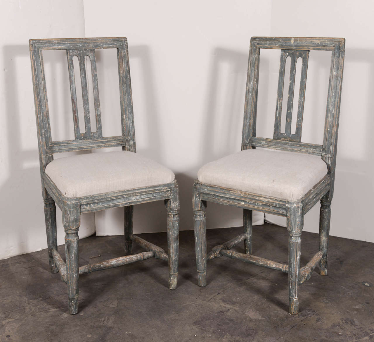 Lovely set of six Swedish period Gustavian chairs with original scraped blue paint and newly upholstered vintage linen seats.