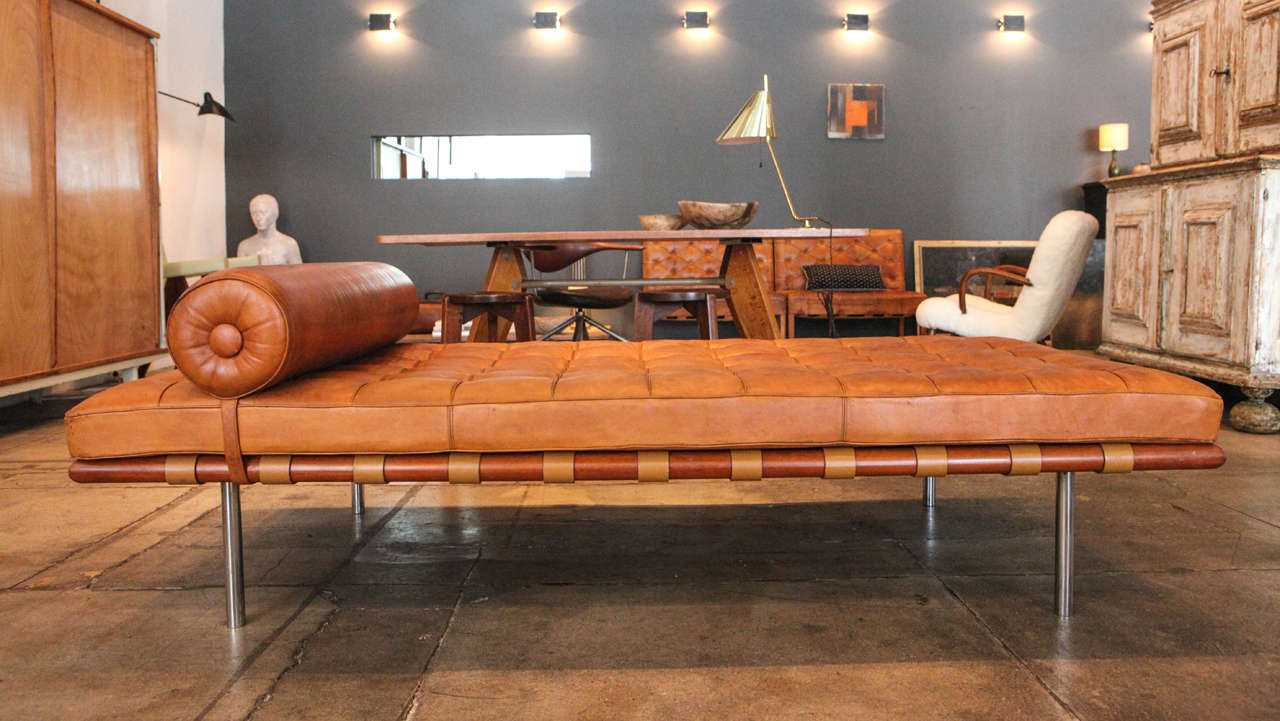 Mies van der Rohe's iconic daybed in it's original and beautifully patinated leather mattress and headrest.