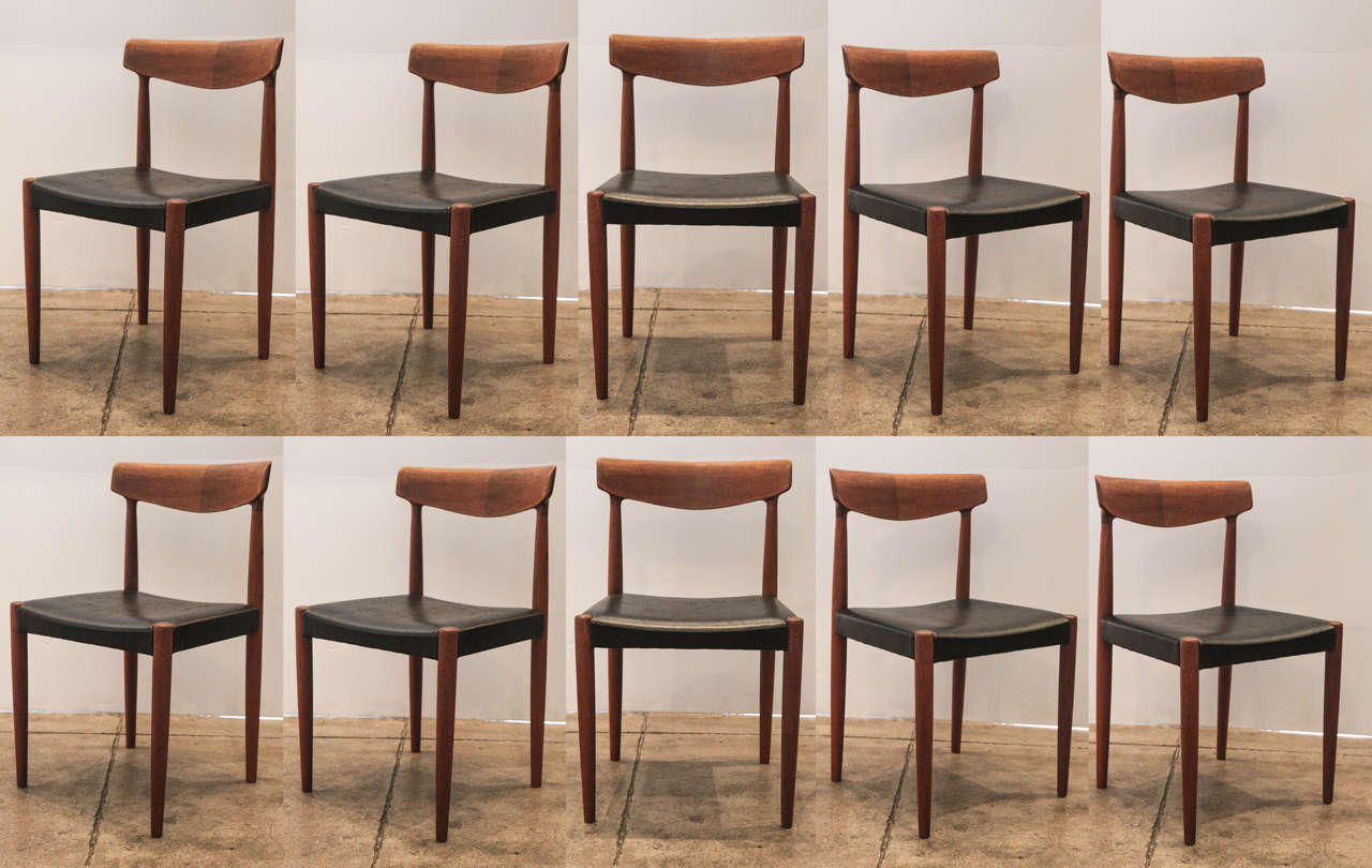 A set of ten teak and leather dining chairs by Danish designer Knud Faerch.
Sold only as a set.