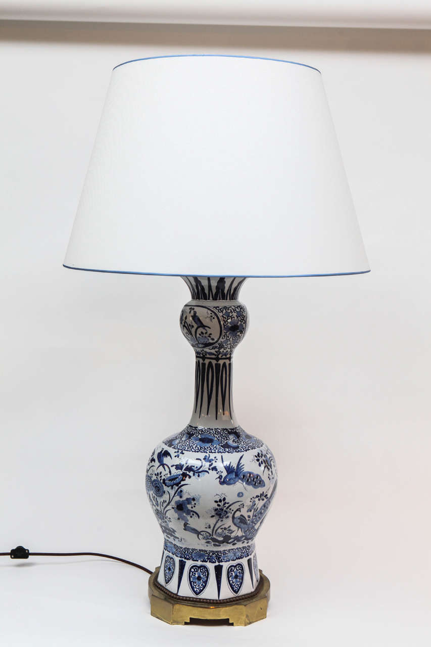 A monumental French Blue and White Faience Vase, c. 1780,
now mounted as a lamp with a Custom Linen Shade with Silk Edges