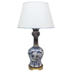 A French Blue and White Faience Vase, c. 1780, mounted as a lamp