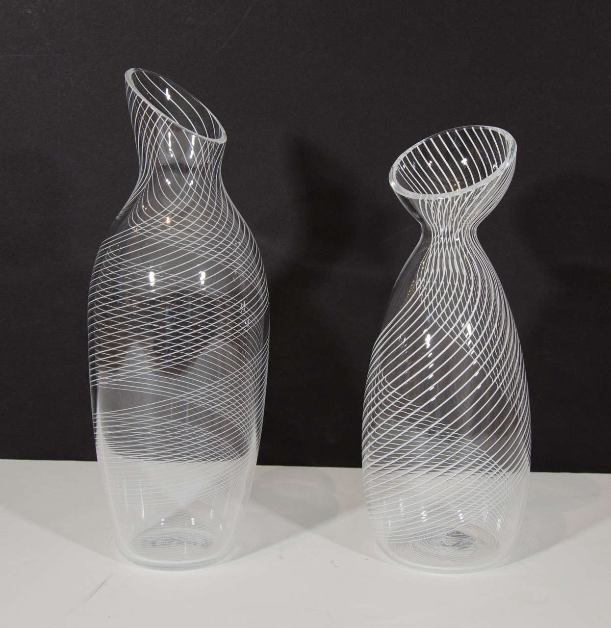 Hand-blown glass decanters by Cartwright New York. Made locally in Brooklyn.  Sold separately. Sizes vary but approximately 12