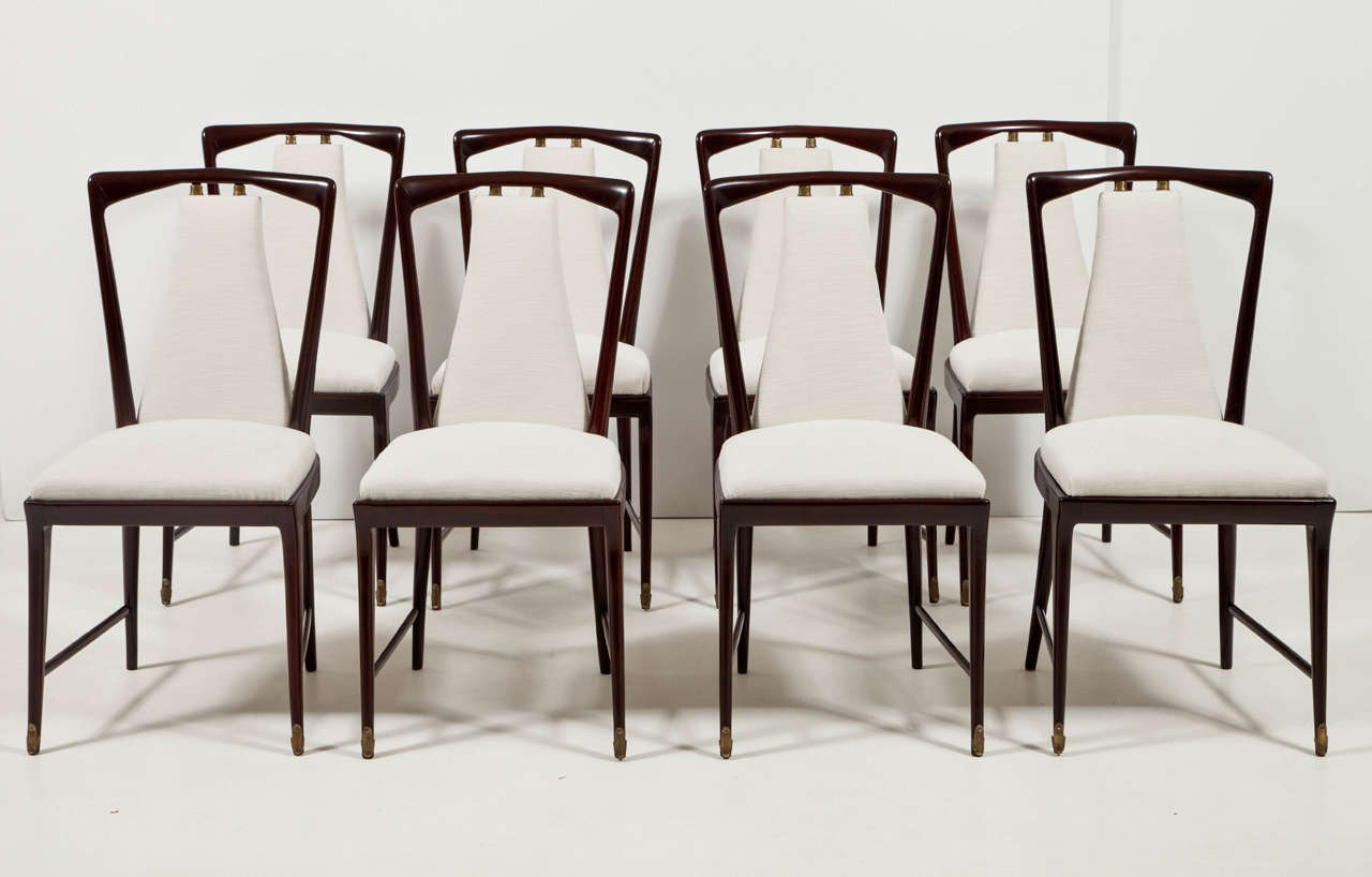 These chairs have been refinished and recently reupholstered with a white cotton fabric.
Elegant bronze details.