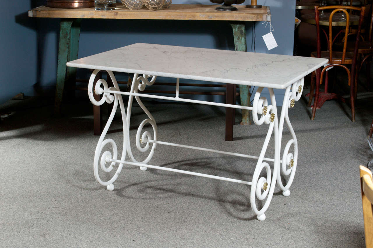White marble top butcher/pastry table on a white painted cast iron base