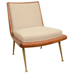 A T.H. Robsjohn-Gibbings Upholstered Slipper Chair with Brass Legs.