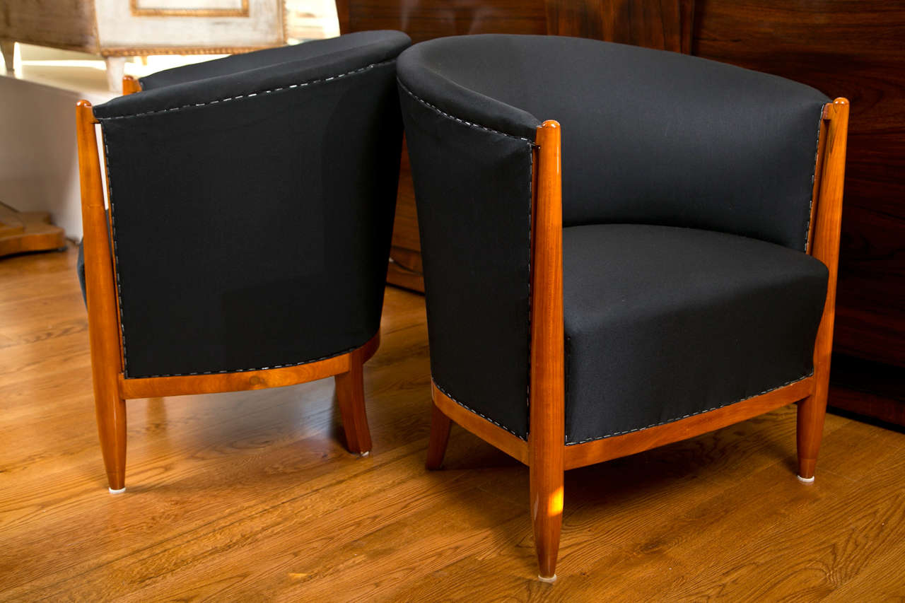 Pair of sleek French Art Deco Bergeres in solid cherry wood, reupholstered and fabric ready
 
