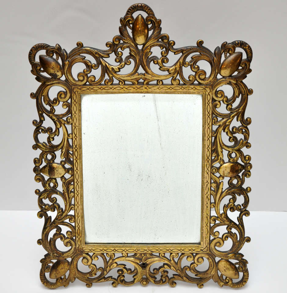 Pair of Mirrors in Ornate Brass Frames